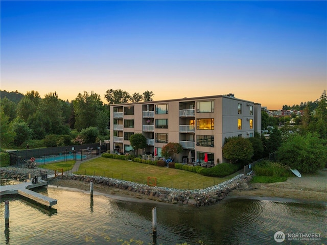 9717 NE Juanita Dr Unit 301A, Kirkland, WA 98034 - dock area featuring a water view and a yard