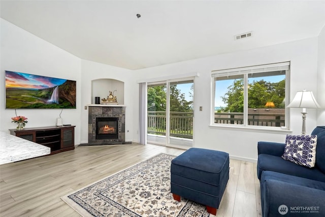 901 E Marine View Dr Unit 206, Everett, WA 98201 - living area featuring wood finished floors and a fireplace