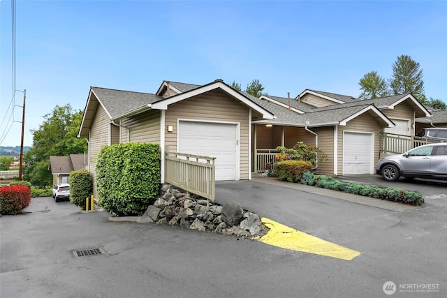 901 E Marine View Dr Unit 206, Everett, WA 98201 - single story home featuring a garage and a shingled roof