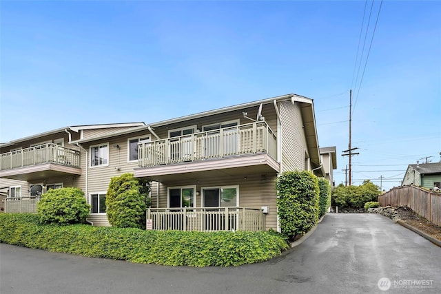 901 E Marine View Dr Unit 206, Everett, WA 98201 - exterior space featuring a balcony and asphalt driveway
