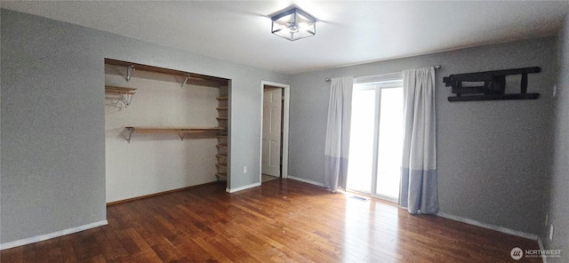 5903 187th Ave SW, Rochester, WA 98579 - unfurnished bedroom with wood finished floors and a closet