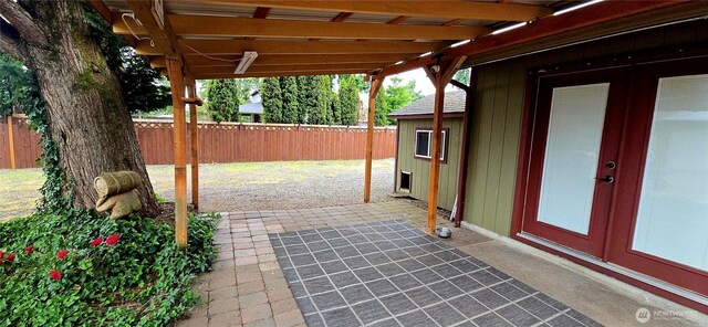5903 187th Ave SW, Rochester, WA 98579 - fenced backyard featuring french doors and a patio