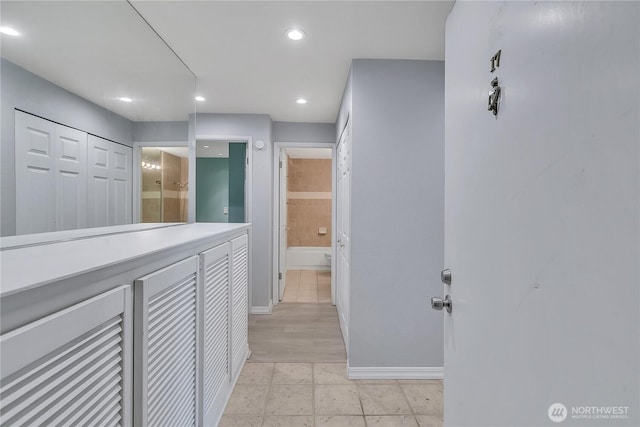 762 Hayes St Unit 17, Seattle, WA 98109 - hallway featuring baseboards and recessed lighting
