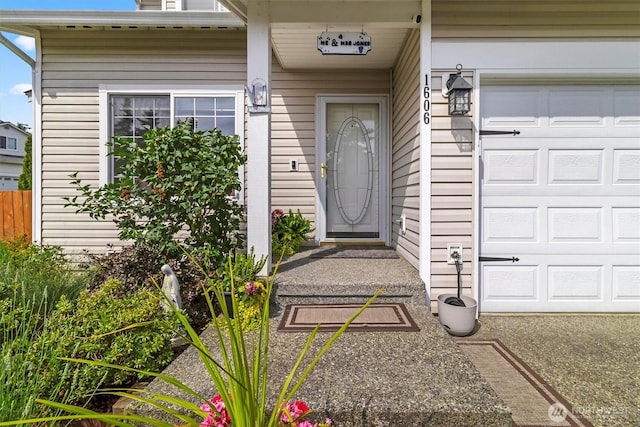 1606 94th Ave NE, Lake Stevens, WA 98258 - doorway to property with an attached garage