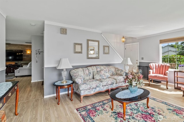 1606 94th Ave NE, Lake Stevens, WA 98258 - living room featuring wood finished floors, crown molding, and radiator