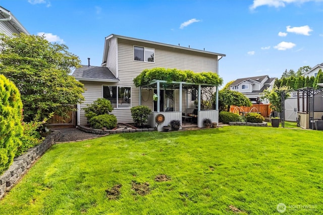 1606 94th Ave NE, Lake Stevens, WA 98258 - rear view of house featuring a sunroom, a shingled roof, and a gate