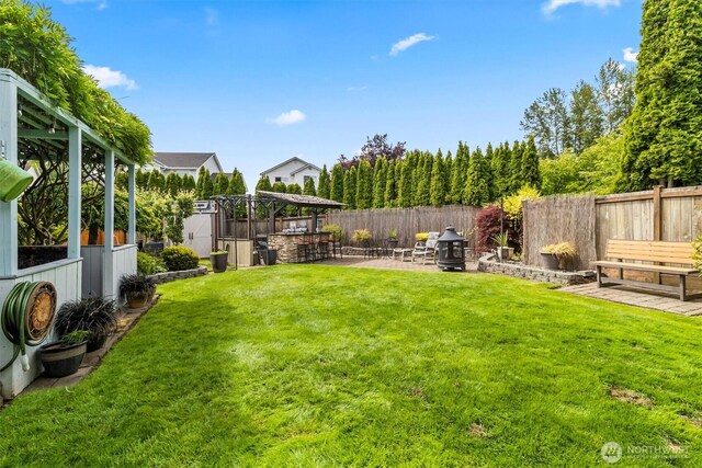 1606 94th Ave NE, Lake Stevens, WA 98258 - fenced backyard with a patio