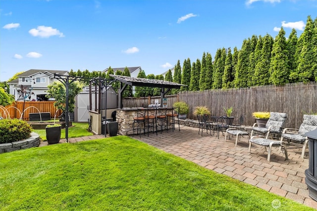 1606 94th Ave NE, Lake Stevens, WA 98258 - fenced backyard featuring a storage unit and a patio area