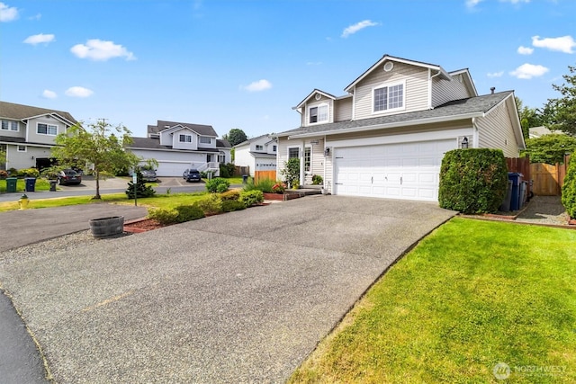 1606 94th Ave NE, Lake Stevens, WA 98258 - traditional home featuring driveway, an attached garage, a residential view, and a shingled roof