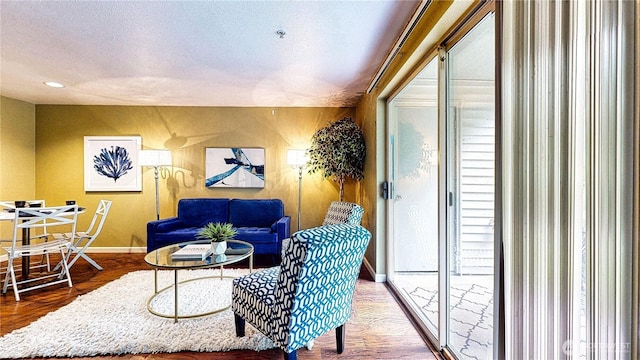 23301 Cedar Way Unit U102, Mountlake Terrace, WA 98043 - living room featuring wood finished floors, plenty of natural light, and recessed lighting