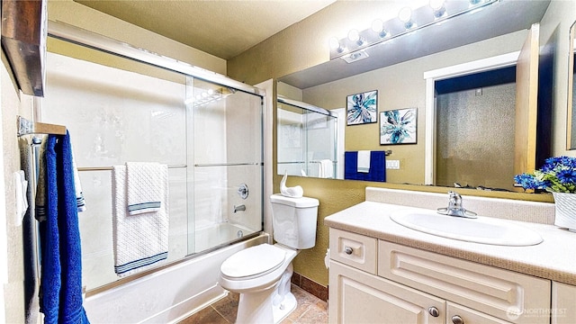 23301 Cedar Way Unit U102, Mountlake Terrace, WA 98043 - full bath featuring vanity, bath / shower combo with glass door, and tile patterned floors