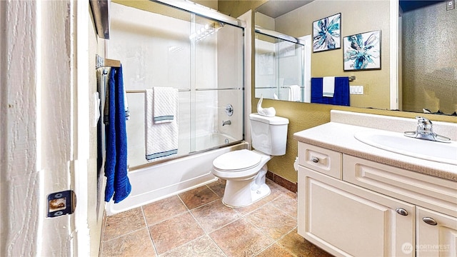 23301 Cedar Way Unit U102, Mountlake Terrace, WA 98043 - full bathroom with vanity, shower / bath combination with glass door, and a textured wall