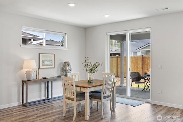 18231 132nd Ave E, Puyallup, WA 98374 - dining space with wood finished floors, plenty of natural light, and recessed lighting