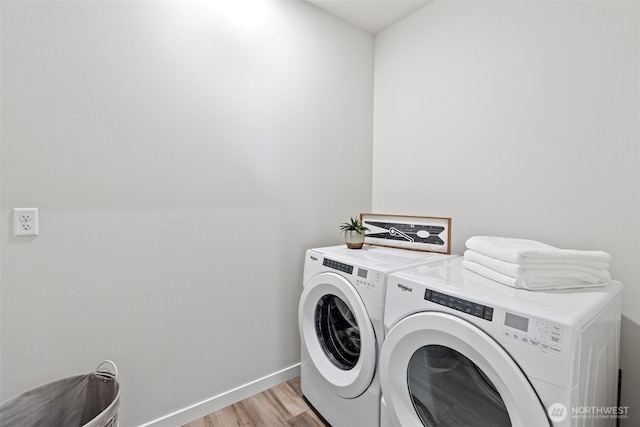 18231 132nd Ave E, Puyallup, WA 98374 - laundry room featuring separate washer and dryer and light wood-style flooring