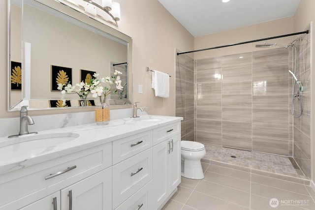8441 8th Ave SW, Seattle, WA 98106 - bathroom with double vanity, tile patterned floors, and tiled shower