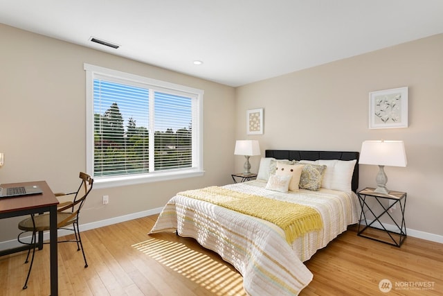 8441 8th Ave SW, Seattle, WA 98106 - bedroom with light wood-style floors and recessed lighting