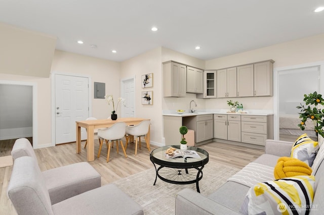 8441 8th Ave SW, Seattle, WA 98106 - living room with light wood-style floors, recessed lighting, and electric panel