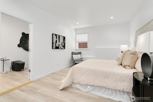 8441 8th Ave SW, Seattle, WA 98106 - bedroom featuring light wood-style flooring and recessed lighting