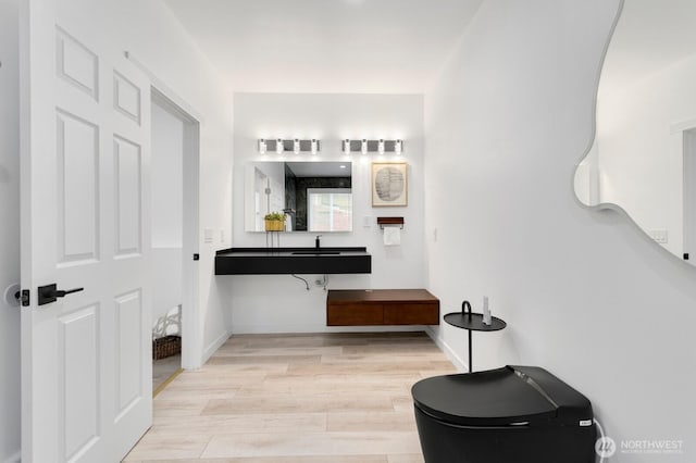 8441 8th Ave SW, Seattle, WA 98106 - bathroom with wood finished floors and baseboards