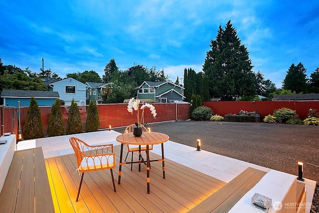 8441 8th Ave SW, Seattle, WA 98106 - wooden deck featuring a fenced backyard and a patio area