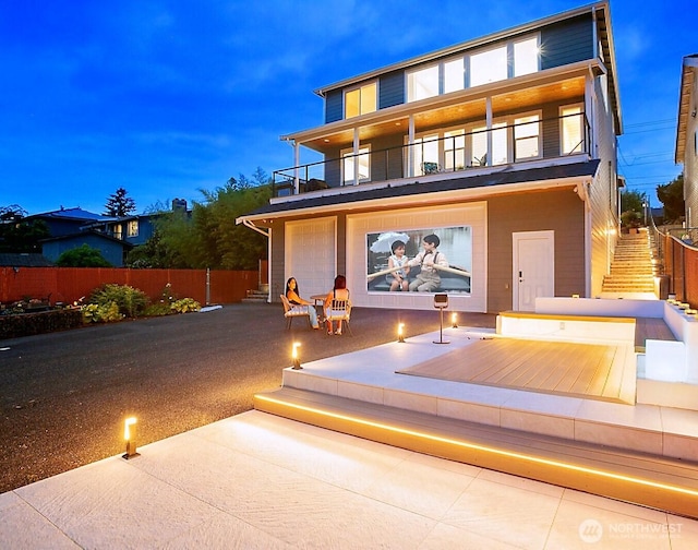 8441 8th Ave SW, Seattle, WA 98106 - back of house with a balcony, stairs, and a patio