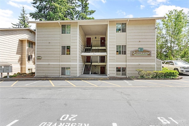 3100 Bill Mcdonald Pkwy Unit E101, Bellingham, WA 98225 - view of building exterior with uncovered parking
