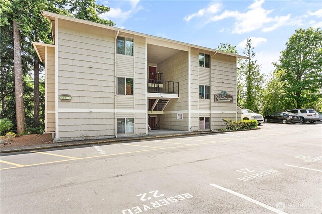 3100 Bill Mcdonald Pkwy Unit E101, Bellingham, WA 98225 - view of building exterior featuring uncovered parking