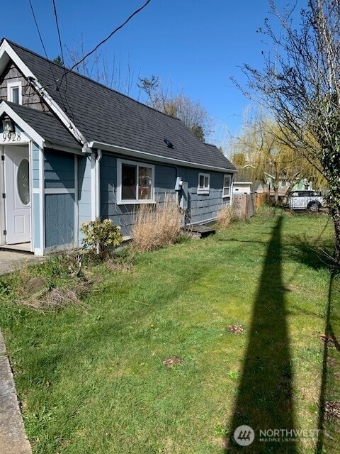 9928 Yakima Ave S, Tacoma, WA 98444 - rear view of property with a shingled roof