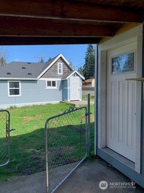 9928 Yakima Ave S, Tacoma, WA 98444 - exterior space with unfinished concrete floors and beam ceiling