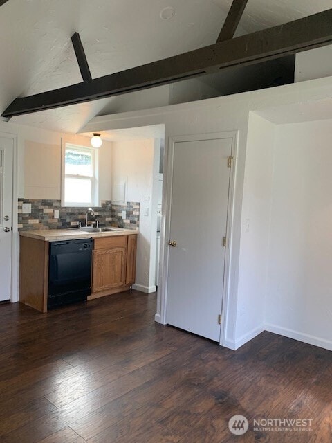 9928 Yakima Ave S, Tacoma, WA 98444 - kitchen with dishwasher, decorative backsplash, light countertops, dark wood-style flooring, and brown cabinetry