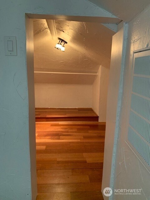 9928 Yakima Ave S, Tacoma, WA 98444 - hallway featuring wood finished floors
