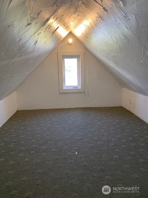 9928 Yakima Ave S, Tacoma, WA 98444 - additional living space featuring lofted ceiling and carpet floors