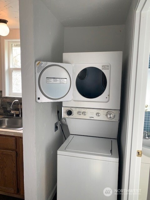 9928 Yakima Ave S, Tacoma, WA 98444 - laundry room with estacked washer and dryer