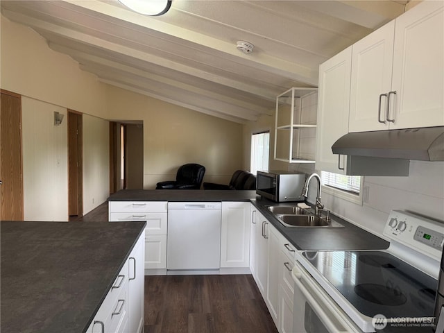 31 House Rd, Sequim, WA 98382 - kitchen with white appliances, under cabinet range hood, dark countertops, and a peninsula