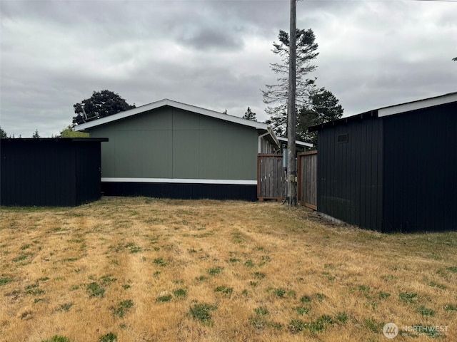 31 House Rd, Sequim, WA 98382 - view of grassy yard featuring an outdoor structure and a pole building