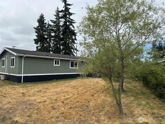 31 House Rd, Sequim, WA 98382 - view of side of property featuring a yard and a central air condition unit