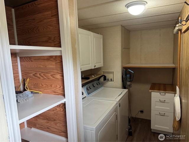 31 House Rd, Sequim, WA 98382 - laundry area featuring washing machine and dryer, cabinet space, and dark wood-type flooring