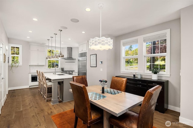901 W Mcgraw St Unit 6, Seattle, WA 98119 - dining area featuring recessed lighting and wood finished floors