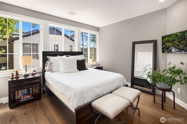 901 W Mcgraw St Unit 6, Seattle, WA 98119 - bedroom featuring wood finished floors and recessed lighting