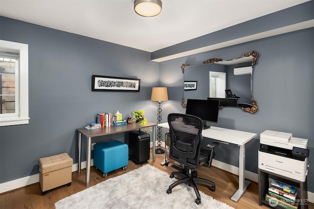 901 W Mcgraw St Unit 6, Seattle, WA 98119 - office area with a wall unit AC and wood finished floors