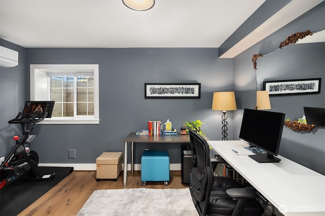 901 W Mcgraw St Unit 6, Seattle, WA 98119 - office area with wood finished floors and a wall unit AC
