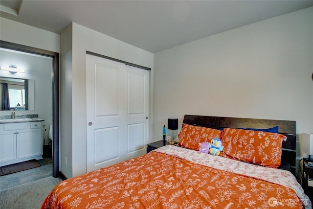 1651SW Mulberry St Unit E304, Oak Harbor, WA 98277 - carpeted bedroom featuring ensuite bathroom and a closet