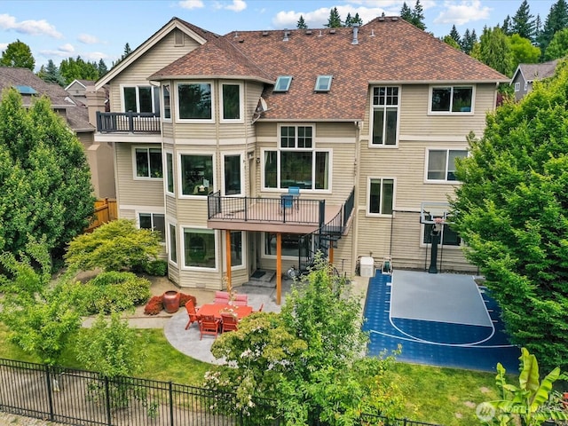 2135 204th Pl NE, Sammamish, WA 98074 - back of house with basketball court, stairs, a patio, and a shingled roof