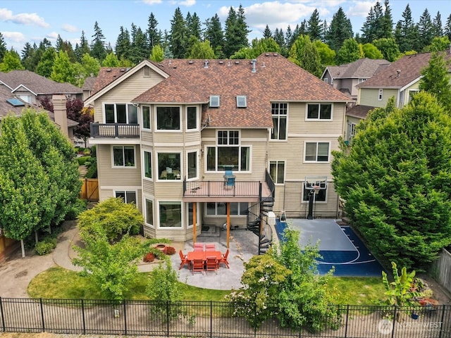 2135 204th Pl NE, Sammamish, WA 98074 - back of property featuring a patio area, stairs, a shingled roof, and view of scattered trees