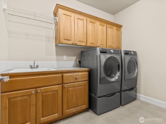 2135 204th Pl NE, Sammamish, WA 98074 - washroom with separate washer and dryer and cabinet space