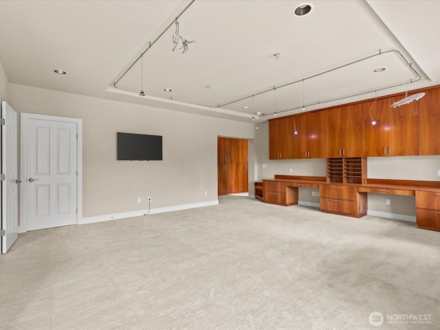 2135 204th Pl NE, Sammamish, WA 98074 - unfurnished living room with built in study area, light carpet, and recessed lighting