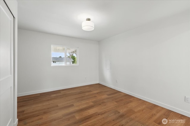 40 E Robert Pl, Sequim, WA 98382 - unfurnished bedroom featuring wood finished floors and a closet