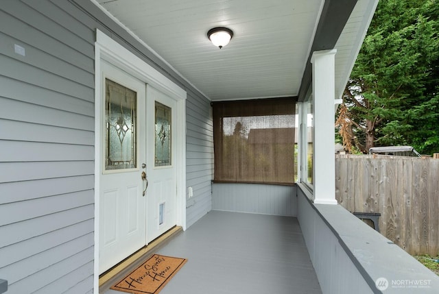 27902 69th Ave NW, Stanwood, WA 98292 - doorway to property featuring covered porch