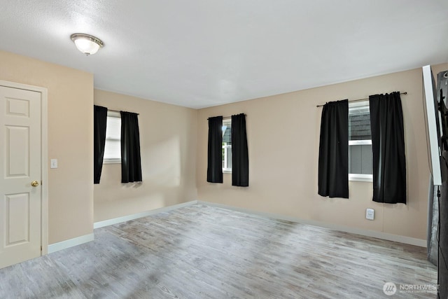 27902 69th Ave NW, Stanwood, WA 98292 - unfurnished room with wood finished floors