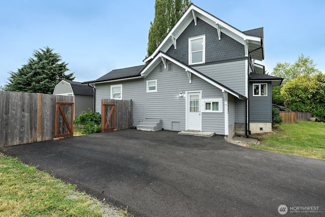 27902 69th Ave NW, Stanwood, WA 98292 - rear view of house with a gate